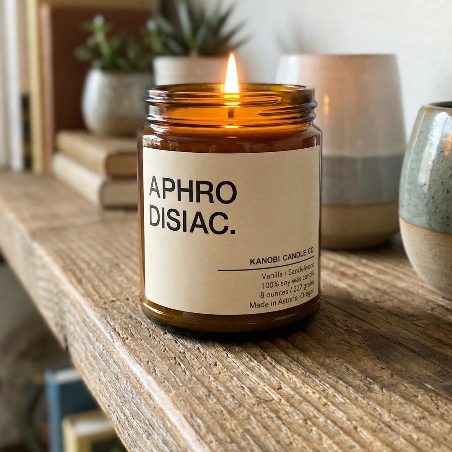 APHRODISIAC hand-poured soy candle burning warm fragrance