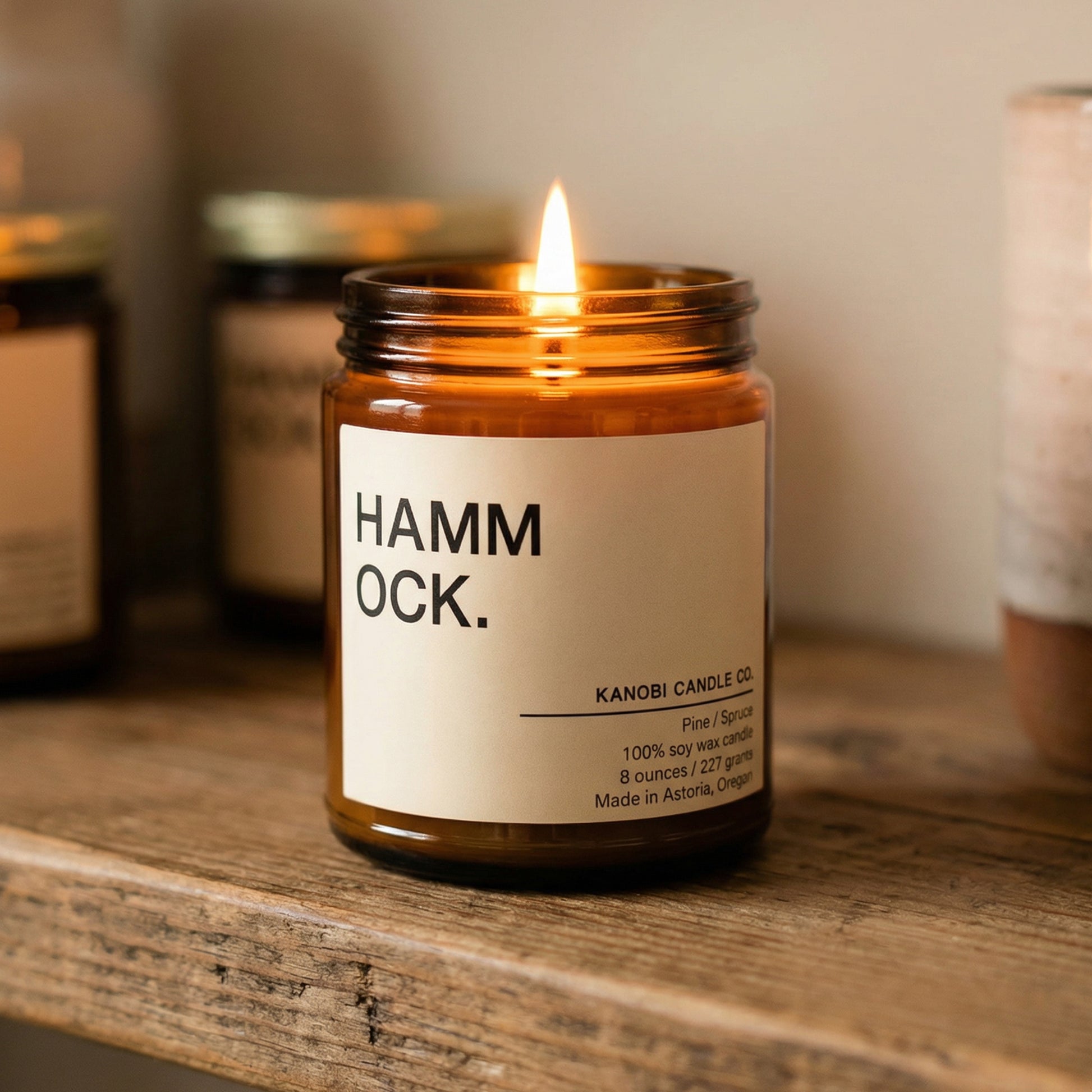 HAMMOCK hand-poured soy candle burning woodsy fragrance