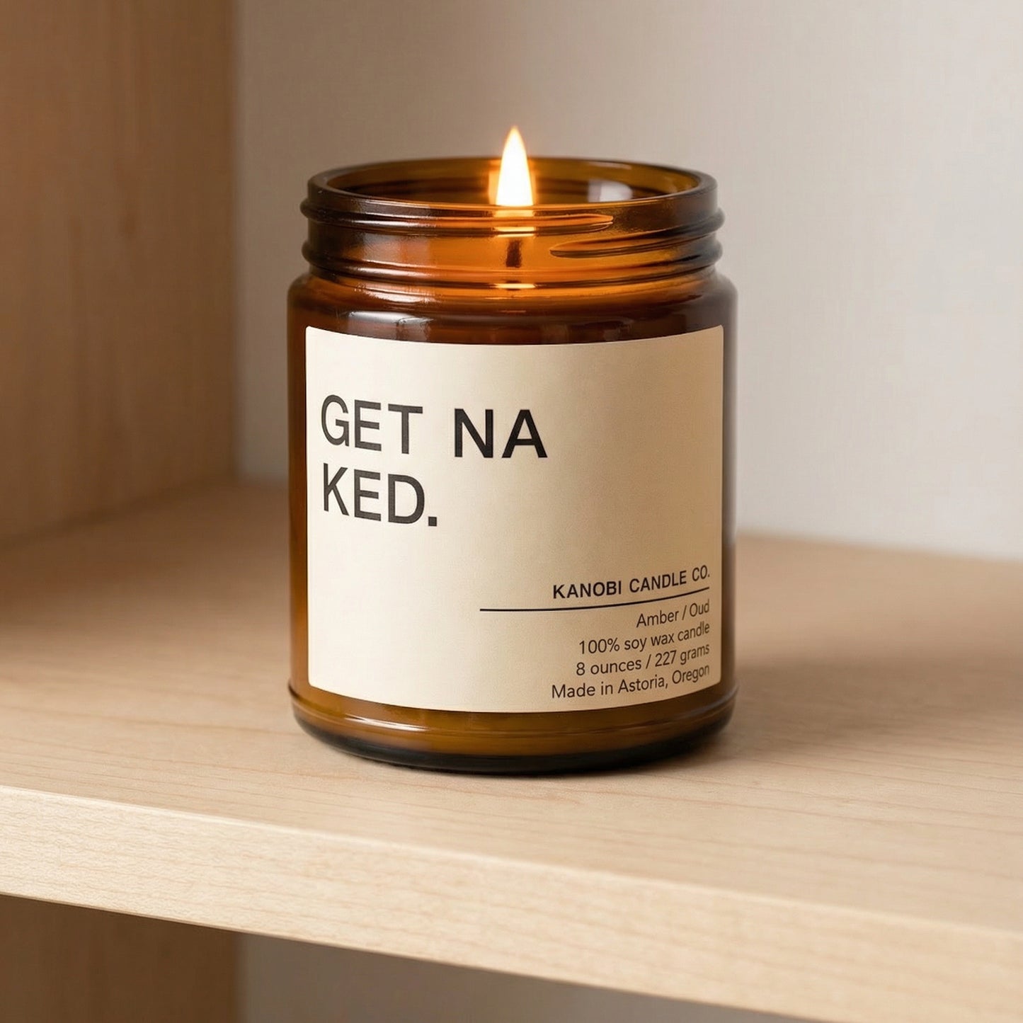 GET NAKED hand-poured soy candle burning warm sensual scent