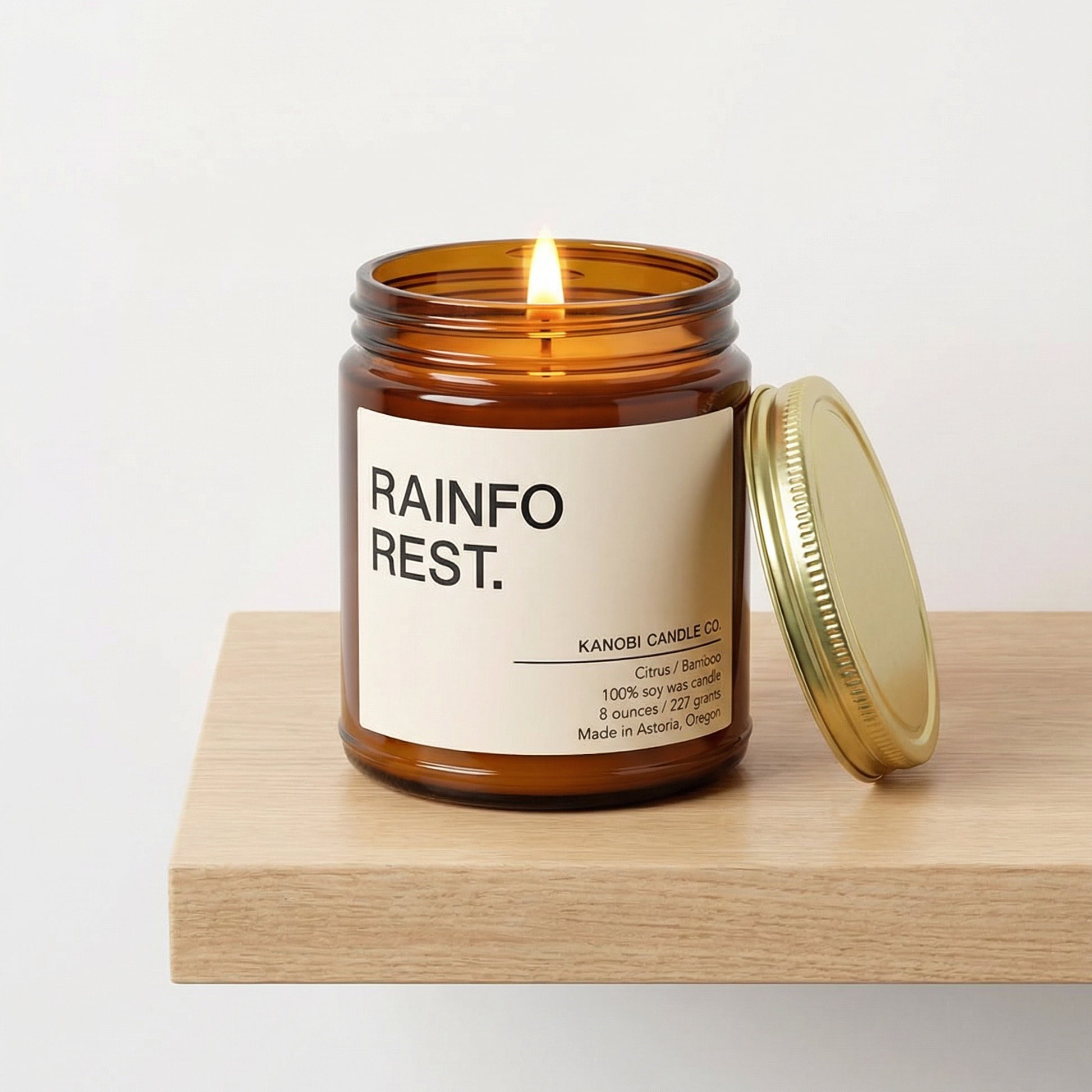 RAINFOREST hand-poured soy candle burning fresh forest fragrance
